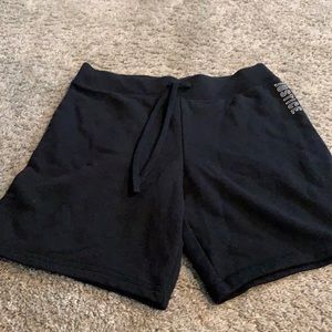 Excellent condition girls Justice black sweat style shorts size 12.